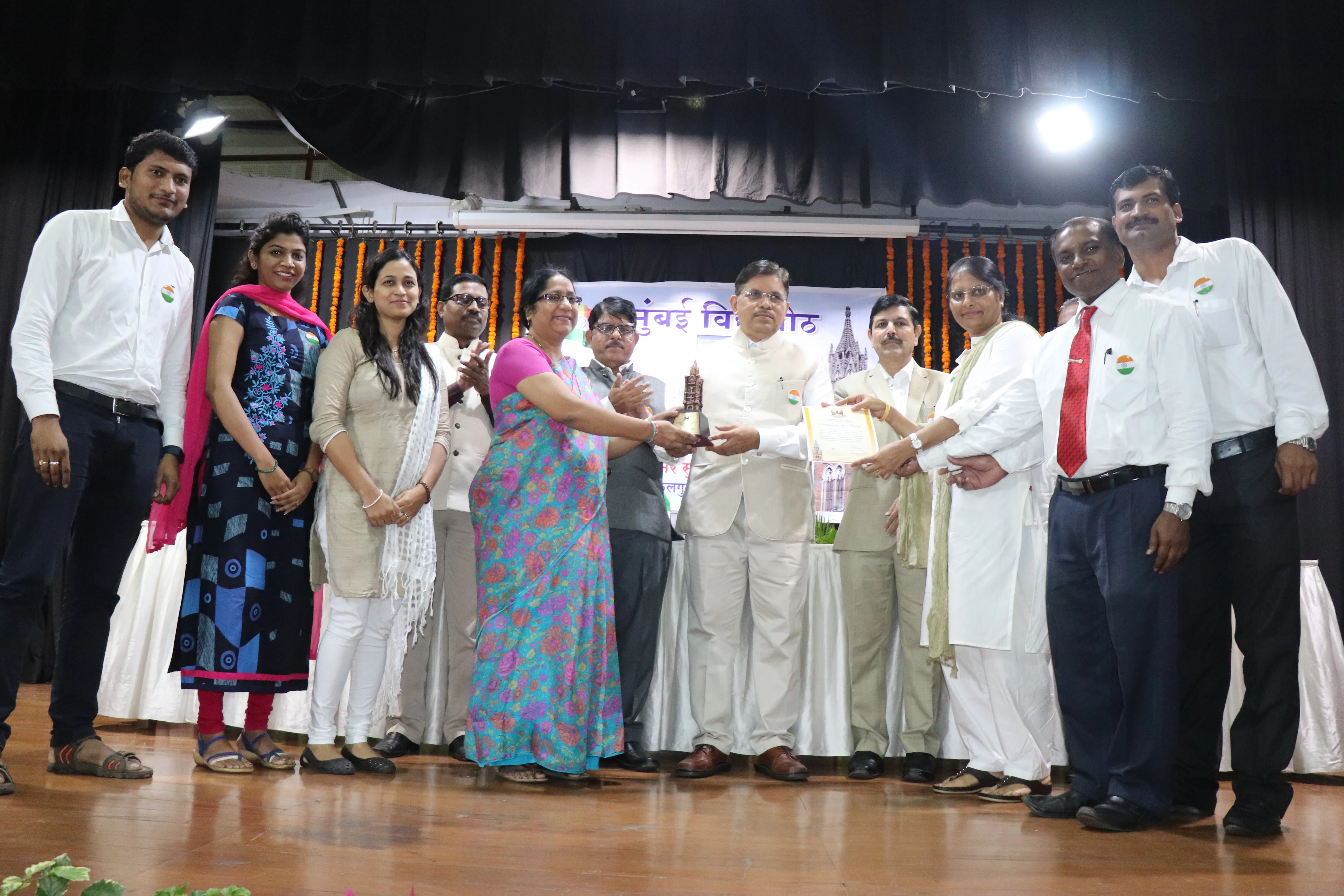 Team Avishkar receiving overall championship certificate with auspicios hads of Hon. Vice Chancellor,University of Mumbai